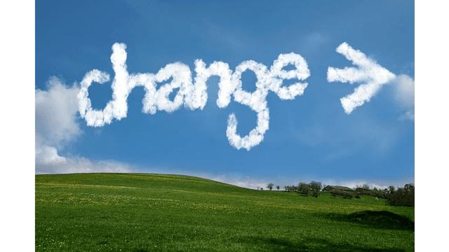 The word "change" written in cloud-like text in the sky with an arrow pointing rightwards.